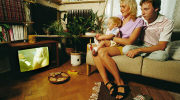 BUDAPEST, HUNGARY - MAY 1990: A typical Hungarian family photographed watching porn transmitted on Saturday night TV. (Photo by Tom Stoddart/Getty Images)