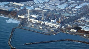 FILE - This aerial photo shows the Fukushima Daiichi nuclear power plant in Okuma town, Fukushima prefecture, north of Tokyo, on March 17, 2022. Japan on Thursday, Dec. 22, adopted a new policy promoting greater use of nuclear energy to ensure a stable power supply amid global fuel shortages and reduce carbon emissions - a major reversal of its phase-out plan since the Fukushima crisis. (Shohei Miyano/Kyodo News via AP, File)