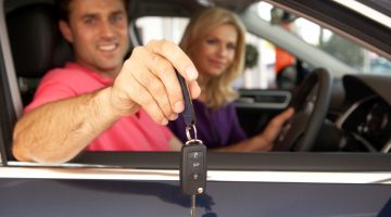 couple buying new car