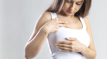 woman do breast self exam