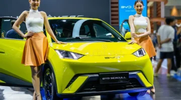 byd seagull light green color subcompact electric car chinese company two beautiful girls models byd seagull 315367167