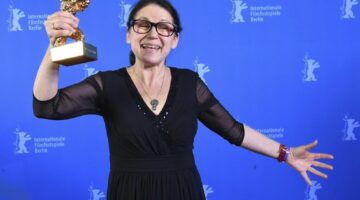 Hungarian author and director Ildik' Enyedi, 'On Body and Soul' poses for photographers after winning the Golden Bear for Best Film at the awards ceremony of the 67th Berlinale Film Festival in Berlin, Germany, Saturday Feb. 18 2017. (Britta Pedersen/Pool Photo via AP)
