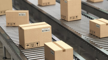 Cardboard boxes on conveyor roller in distribution warehouse, Delivery and packaging service concept. 3d illustration