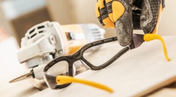 Construction Safety Glasses Closeup. Industrial Equipment.