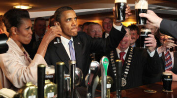 MONEYGALL, IRELAND - MAY 23:  U.S. President Barack Obama enjoys a glass of Guinness in his ancestral home of Moneygall alongside First Lady Michelle Obama (L)  on May 23, 2011 in Moneygall, Ireland. U.S. President Obama is visiting Ireland for one day at the start of a week long tour of Europe. He will meet with distant relatives in Moneygall and speak at a rally in central Dublin after a concert.   (Photo by Irish Government - Pool/Getty Images)  *** BESTPIX ***