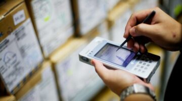 Employee Taking Inventory on PDA