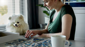 Young,Woman,Doing,Jigsaw,Puzzles